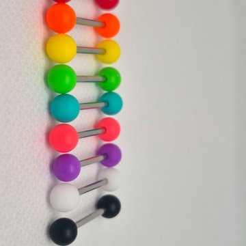 Double gem nipple/tongue barbells  